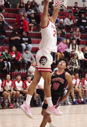 Dale's Jerimiah Skaggs sinks a slam dunk during the Nov. 21 Pink Out home game against Frontier. The Pirates won 88-47. Natasha Dunagan, Countywide &amp;amp; Sun