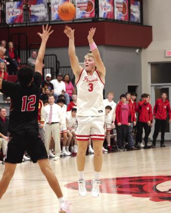 Dale senior Denton Forsythe tries for three points in the Nov. 21 home game against Frontier. Natasha Dunagan, Countywide &amp;amp; Sun