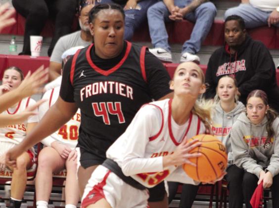 Dale senior Mika Monroe keeps her eyes on the hoop during the Nov. 21 home game against Frontier. The Lady Pirates won 74-36. Natasha Dunagan, Countywide &amp;amp; Sun