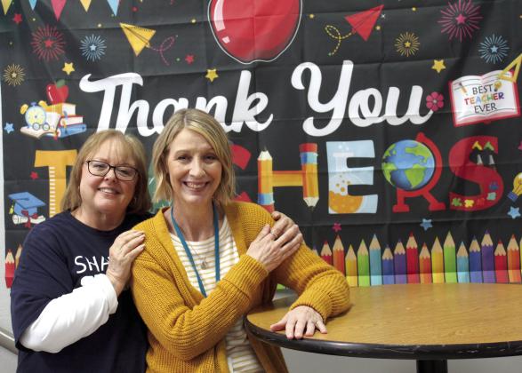 Jim Thorpe Academy Principal Debra Watson and JTA Science Teacher Melisa King pose in front of a sign that reads, “Thank you, Teachers!” on May 14. Watson is retiring after 49 years in education, and King was named the Shawnee Public Schools District Teacher of the Year. Countywide &amp;amp; Sun/Natasha Dunagan