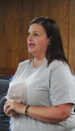 New Will Rogers Elementary Principal Molly Wilson speaks to the Shawnee Board of Education and Superintendent Dr. April Grace after being introduced during the Aug. 1 meeting. Countywide &amp;amp; Sun/Natasha Dunagan