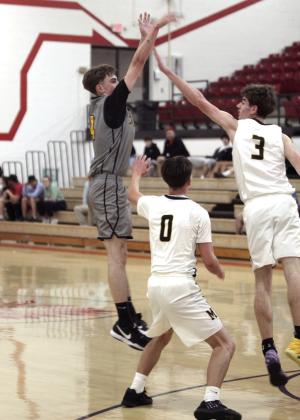 Tecumseh senior Brodey Wood aims for a trey . Natasha Dunagan, Countywide &amp;amp; Sun