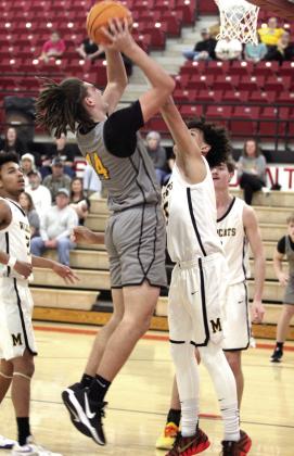 Tecumseh junior Cashawn Thompson sinks a bucket adding two in the win against Madill. Natasha Dunagan, Countywide &amp;amp; Sun
