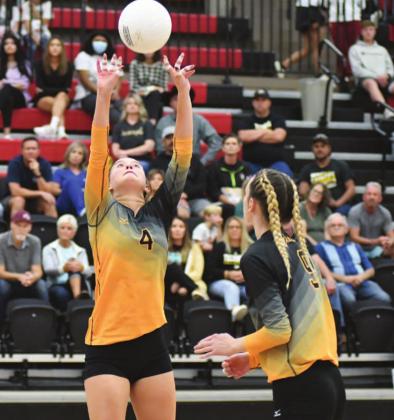 Tecumseh junior, #4 Chloe Kelsey, keeps the ball in play as team mate, #9 junior Brooklynn Nixon stands ready to assist during regional play at North Rock Creek, 0-3 L. Photo courtesy of Brian Blansett