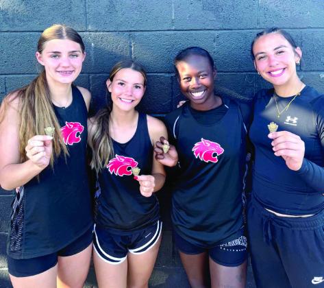 The Lady Wildcats 4x100 Relay team of (pictured from left) Xalina McCarroll (JR), Payten Gentry (SO), Zeaonna McGregor (FR), and Lilly Gentry (FR) finished 6th at Regionals. The Lady Wildcats set a new team record and narrowly missed qualifying state by 500ths of a second with a time of 54.9. Photo courtesy of Earlsboro Track Coach Tim Gentry