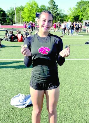 Earlsbor Lady Wildcat freshman Lilly Gentry jumped 16’4” to take 1st place in the Long Jump and ran the 300 Meter Hurdles in 49.47 to finish 2nd at Regionals to qualify for State in both events. Lilly has 4 gold medals and 1 silver on the season between the Long Jump and 300 Meter Hurdles, as well as a bronze in the 4x100 Relay. Photo courtesy of Earlsboro Track Coach Tim Gentry