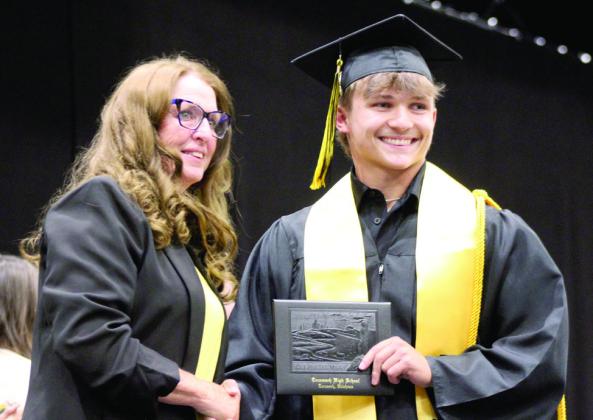 Bingham presents Zant Shirey with his diploma Natasha Dunagan, Countywide &amp;amp; Sun
