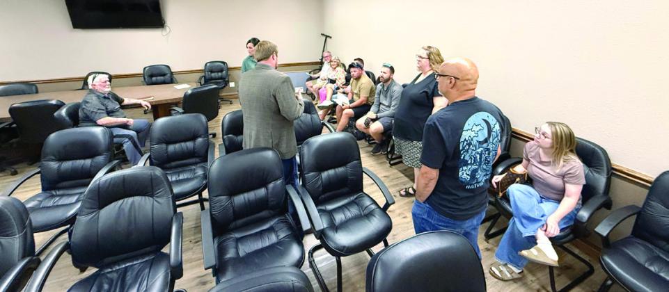 McLoud City Manager Cody Roe spoke to residents of the Meadowridge subdivision about possible options for their road. Julie Talton, Countywide &amp; Sun