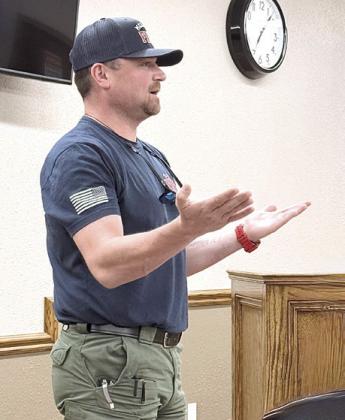 Fire Chief Josh Jenkins addresses the council regarding the upfitting on his fire truck. Julie Talton, Countywide &amp; Sun