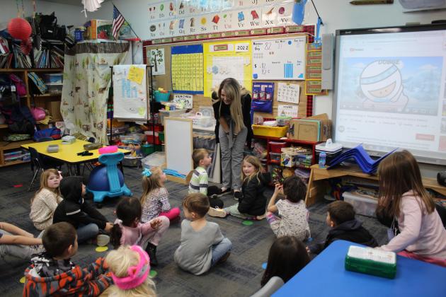 Bethel kindergarten teacher Kerry Ingersoll talks with her students.