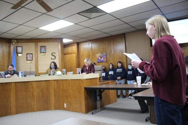 SHS student Marilyn Bartley reads the School Board Recognition Month proclamation at the Shawnee Board of Education meeting Jan. 10.