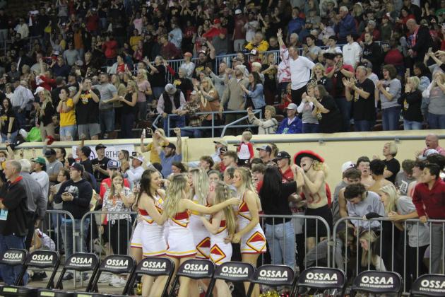 The Dale Cheerleaders, students and fans celebrate the Dale Pirates’ win against Cashion following the Class 2A State Tournament championship game on March 12 at the Fairgrounds Arena in OKC. Dale won 65-58. Countywide &amp; Sun/Natasha Dunagan