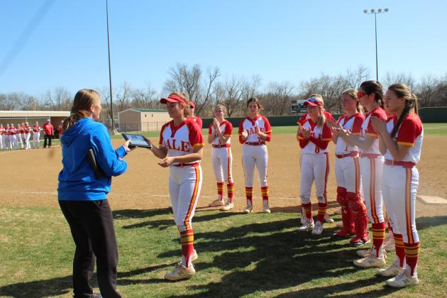 Samantha Hartman accepts the Harrah Tournament trophy.