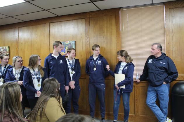 Coach Valarie Colburn introduces the Swim Team members.