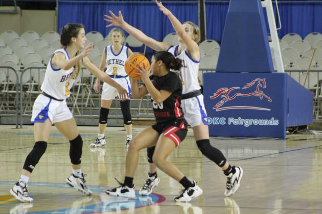 Baylee Tapley, Josie Megehee on defense