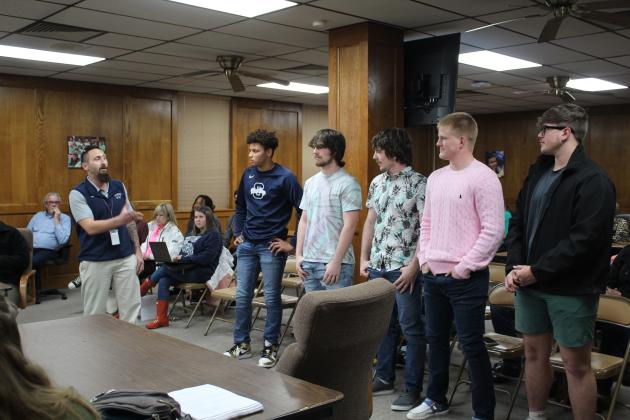 Coach McCune introduces the State Qualifying/Placing Wrestlers.