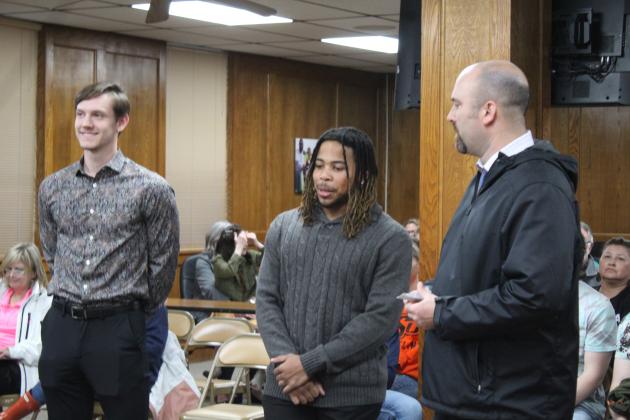 Shawnee Head Basketball Coach Eric Litherland, far right, tells about Tanner Morris, far left, and Jaylon Orange who both exceeded 1000 points in their high school careers. Morris also became the All-Time Leading Scorer for Shawnee. Countywide &amp; Sun/Natasha Dunagan