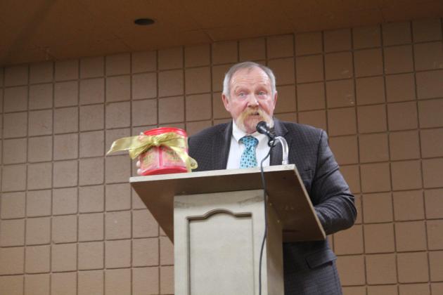 THS Principal Randy Dilbeck made a "spittoon" for Gayla Higgins for retirement.