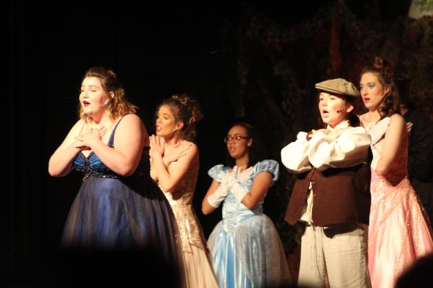The cast sings and dances to "Children Will Listen" on April 8.