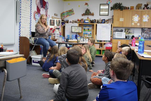 Bethel second-grade teacher Maria Wright reads “The True Story of the 3 Little Pigs” to her class, adding expression to the characters. Wright was one of eight nominated state-wide for the POE Foundation Excellence in Education, “Kathy Cox Elementary Educator Merit Award.” Countywide &amp; Sun/Natasha Dunagan