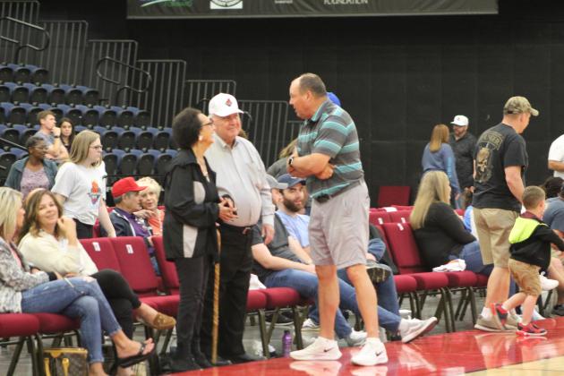 Linda Capps &amp; Rocky Barrett talk with OBU Women's Basketball Coach Bo Overton.