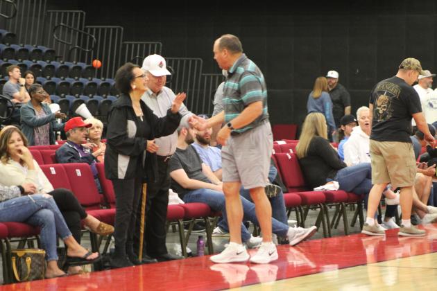 Linda Capps &amp; Rocky Barrett talk with OBU Women's Basketball Coach Bo Overton.
