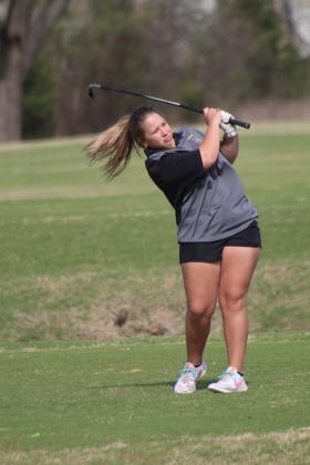 Paige Lowther drives at the Tecumseh Girls Golf Tournament on April 19.