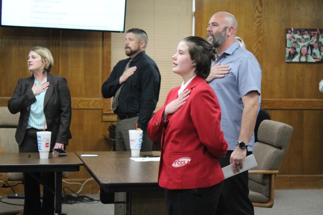 SHS freshman &amp; FCCLA member Meagan James leads the Pledge of Allegiance.