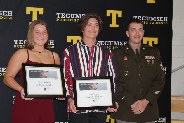 Emily Bingham and Jaxon Meyers were presented the Army Reserve National Scholar/Athlete Award by Staff Sergeant Patrick Alber.