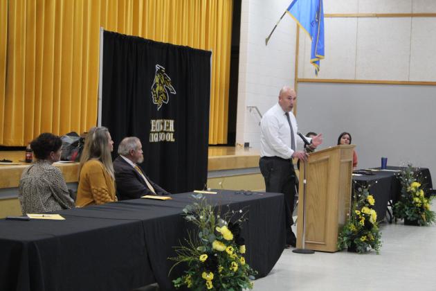 Superintendent Robert Kinsey congratulates the awards' recipients.