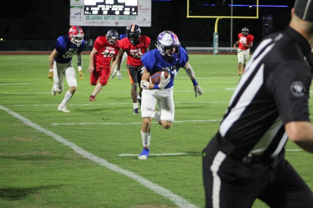 Noah Flores, a graduate of Chickasha, runs in a touchdown for the South Team during the Second Annual CPN All-Star Bowl, held at OBU on June 3. The South Team - which included two players from Bethel, Michael Parsons and Dominick Contreras - won 26-6.