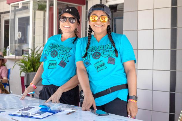 Sally Coleman (left) and Suhaila Nease wore big smiles while running the brackets table. Countywide &amp; Sun/Loren Knight