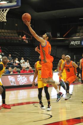 Potawatomi Fire Point Guard Tevin Foster puts up a shot in the fourth quarter of the first Second-Round Playoff game against the Shreveport Mavericks on June 8 at FireLake Arena. The Fire won that game 113-100, but they lost the next two games in Shreveport - 107-120 on June 10, and 110-120 on June 11 - to end their inaugural season.
