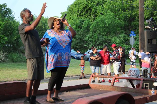 Anice Young performs a gospel song, joined by Roger McClain.