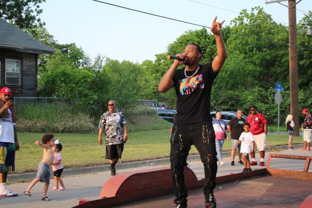 Damian Phillips, aka Young Dame, performs a rap aimed at children.