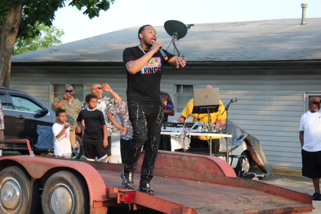 Damian Phillips, aka Young Dame, performs a rap aimed at children.
