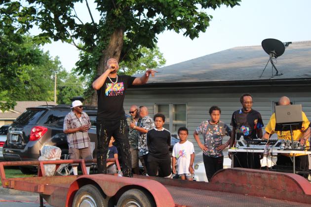 Damian Phillips, aka Young Dame, performs a rap aimed at children.