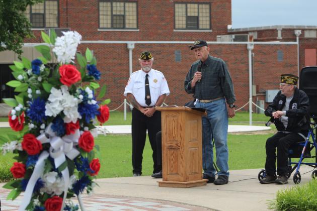 Veterans Memorial Committee member Al Brase speaks as VFW Post 1317 Commander-elect Patrick "Gunny" Koch looks on. The wreath was placed in memory of all fallen soldiers by American Legion Post 16 Commander Richard Filbert and VFW Auxiliary President Barbara White.