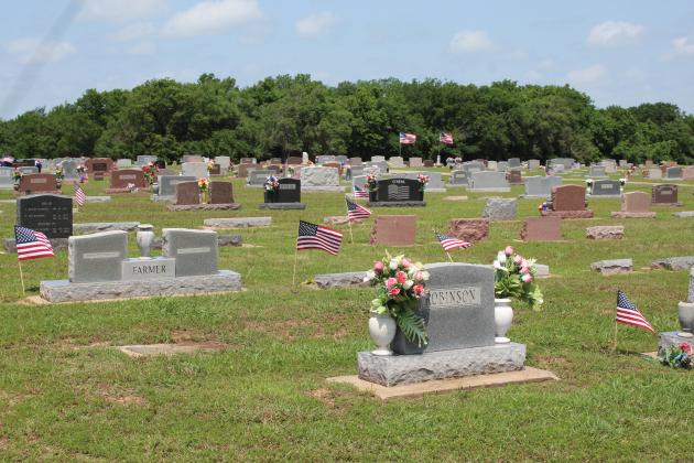 Flags at Tecumseh Cemetery