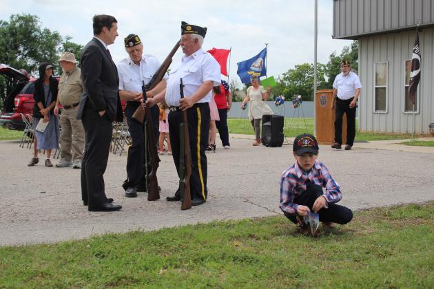 OK Sen. Shane Jett talks with the American Legion Post 260 Members, Daryle Murray picks up spent rounds