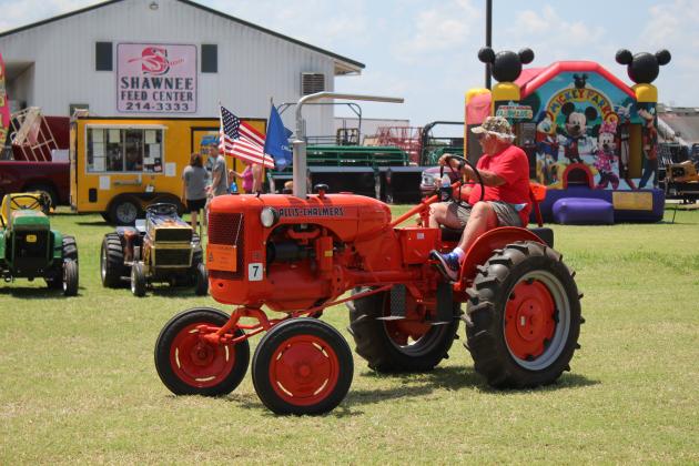 Phil Moore, of Moore, drives his 1947 Allis-Chalmers B during the 23rd Annual Farming Heritage Festival, held at Shawnee Feed Center on June 17-18. Countywide & Sun/Natasha Dunagan