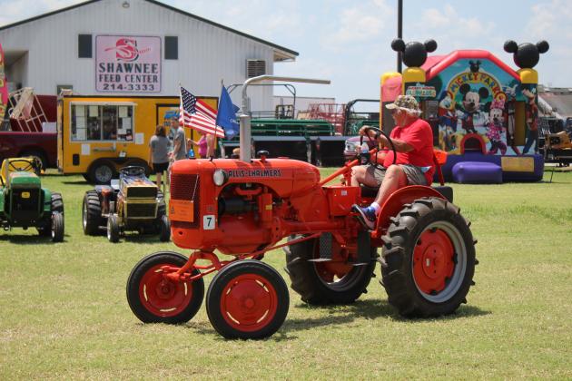 Phil Moore, of Moore, drives his 1947 Allis-Chalmers B during the 23rd Annual Farming Heritage Festival, held at Shawnee Feed Center on June 17-18. Countywide &amp; Sun/Natasha Dunagan