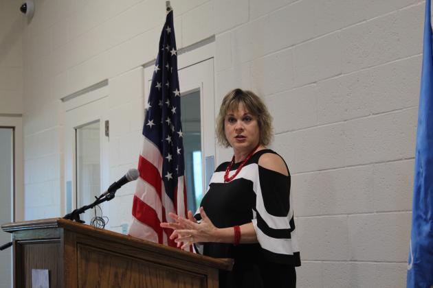 OJA Board Chair Karen Youngblood speaks at the ribbon-cutting ceremony on June 24..