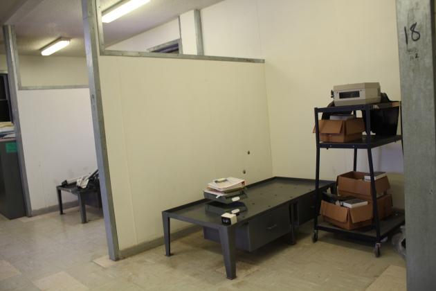 The old sleeping areas at COJC had painted-over windows, if any, a metal bed and desk, and no doors for privacy or security. Some of the old residential buildings were 100 years old, and most have been torn down. A few, such as this, are being considered for other purposes.