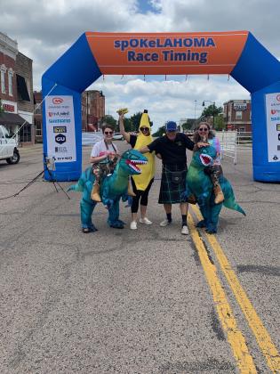 Friends and volunteers joined spOKeLAHOMA owner Craig MacIntyre for the first Fenrir Unchaind bike race in Tecumseh Saturday, June 4. Pictured from left Loren Knight, Jill Spencer, MacIntyre, and Holly Gordon. Photo provided.