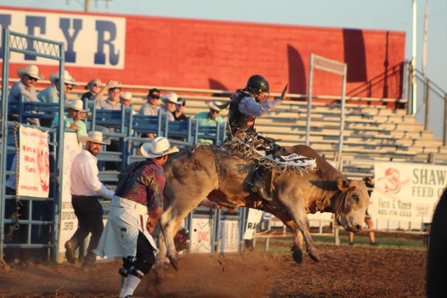 John Crimber, of Decatur, TX, makes an 83 on his bull ride during the IFYR on July 11 at the Heart of Oklahoma Expo Center. The IFYR marks its 30th year with 965 entries from 32 states. Countywide &amp; Sun/Natasha Dunagan