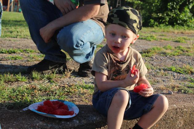 Zackary Collett, 2, of Wanette, enjoys watermelon.