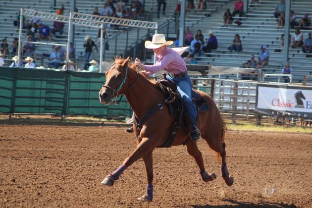 Rachel Kittle, of Woodland, AL, finishes her run in the IFYR Barrel Racing event, as her horse throws a horseshoe, on the morning of July 15. Countywide &amp; Sun/Natasha Dunagan