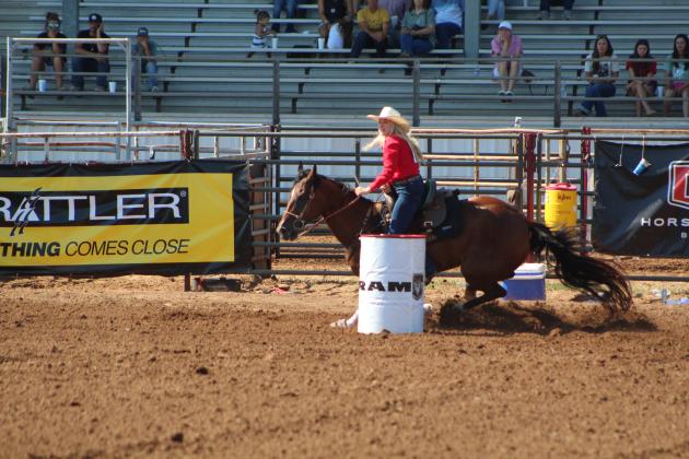 Matraya Haynes, of Maud, competes in barrel racing.