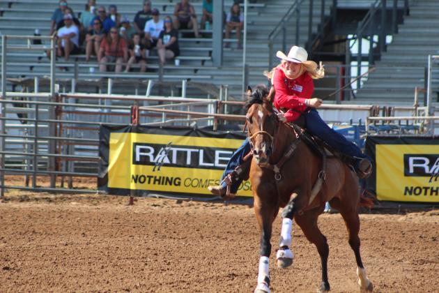 Matraya Haynes, of Maud, competes in barrel racing.